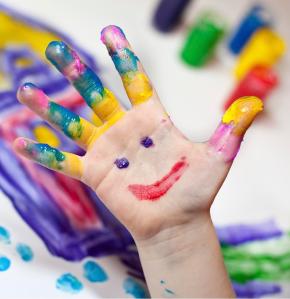 Little Children Hands doing Fingerpainting